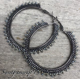 Hematite & black spiked 2 1/2’ hoop earrings, ;are black hoop earrings