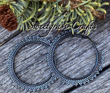 Hematite & black spiked 2 1/2’ hoop earrings, ;are black hoop earrings