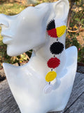 Medicine wheel shoulder duster beaded earrings, medicine wheel smoked hide beaded earrings,