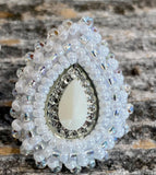 White pearlized teardrop earrings
