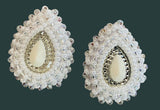 White pearlized teardrop earrings