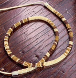 Cream, red & gold beaded round hatband, Indigenous beaded round necklace