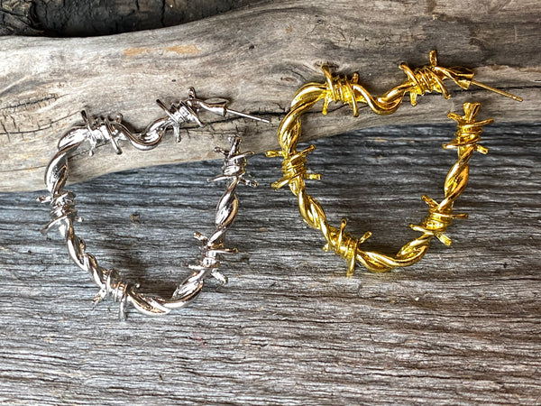 gold and silver barbwire hearts
