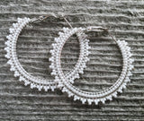  eaded silver & white hoop earrings